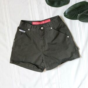 Green Revolt shorts with back buckle adjustment